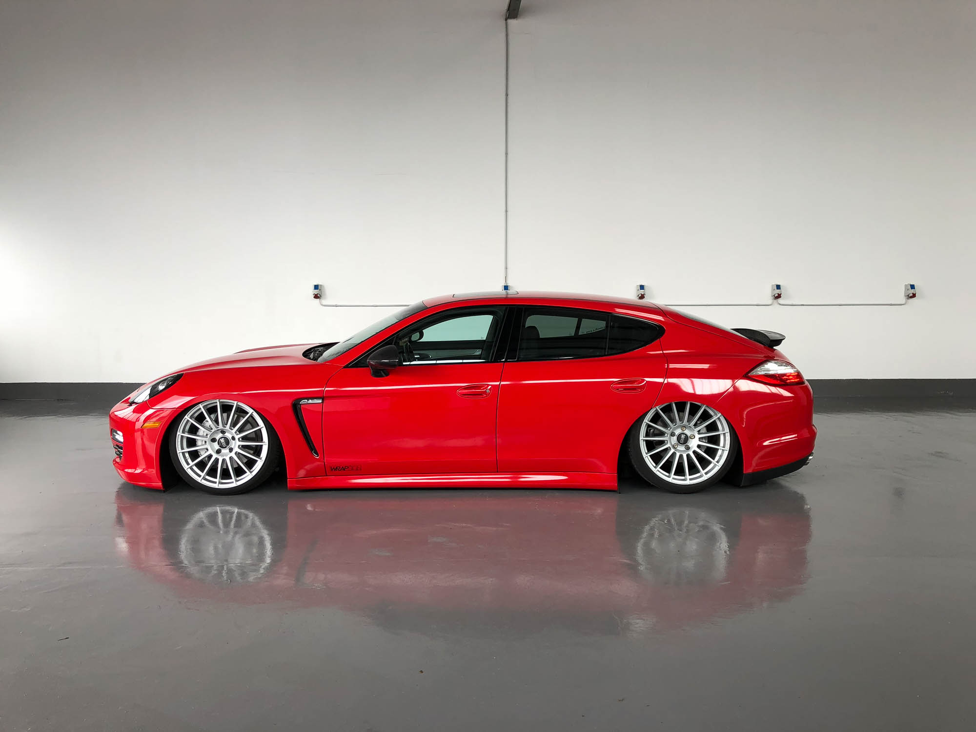 Porsche Panamera in Avery Carmine red gloss