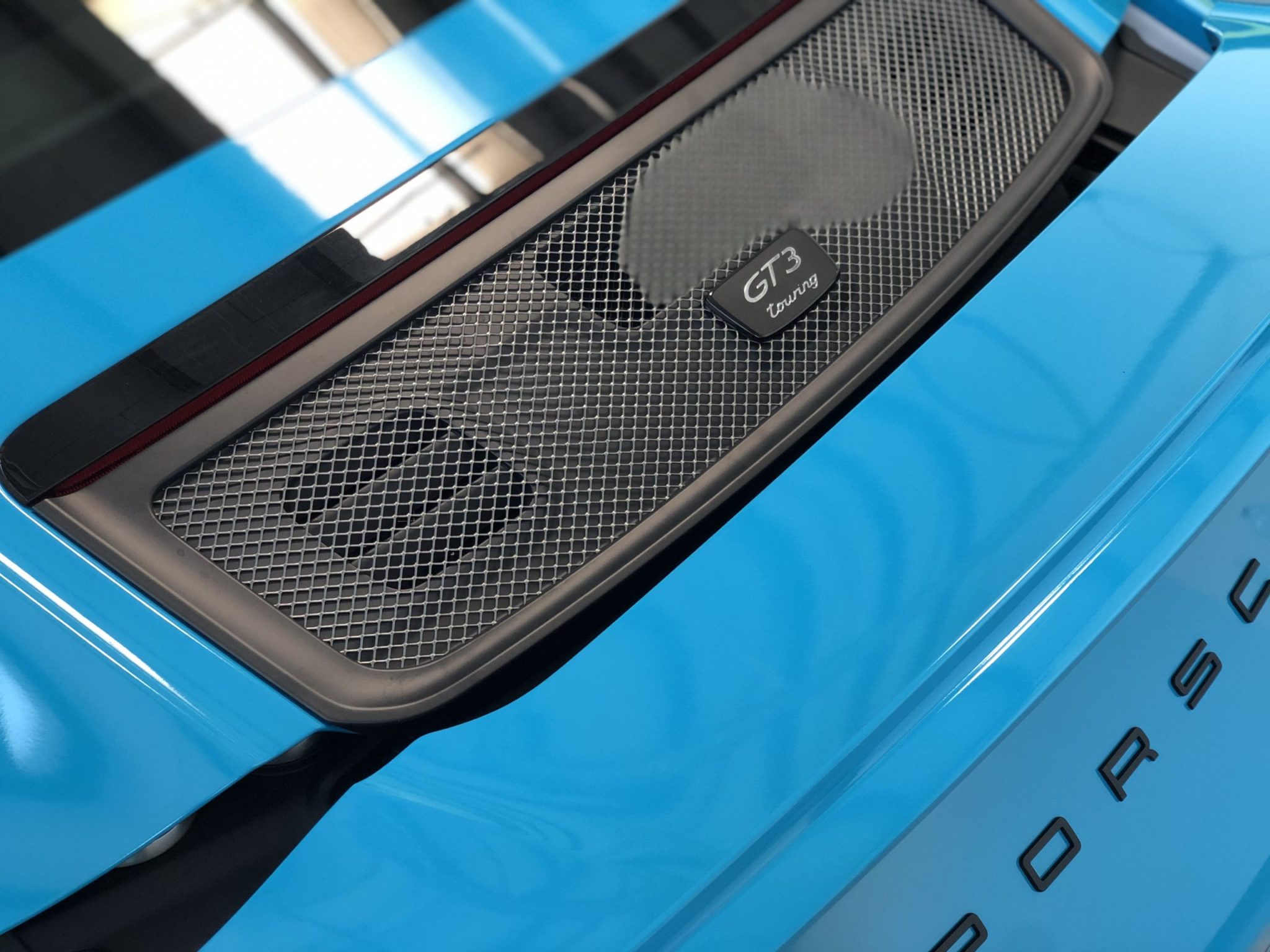 Porsche GT3 Touring Miami Blue Folierung